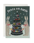 Greeting card with two rabbits holding a decorated Christmas tree and &