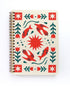 Notebook with a red and green pattern on a white background