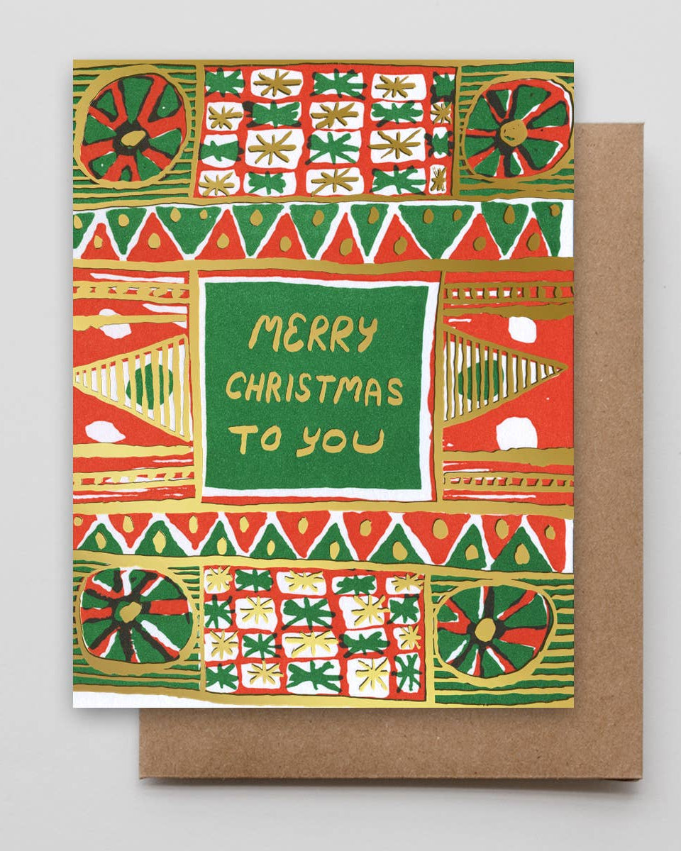 Christmas card with festive pattern and &