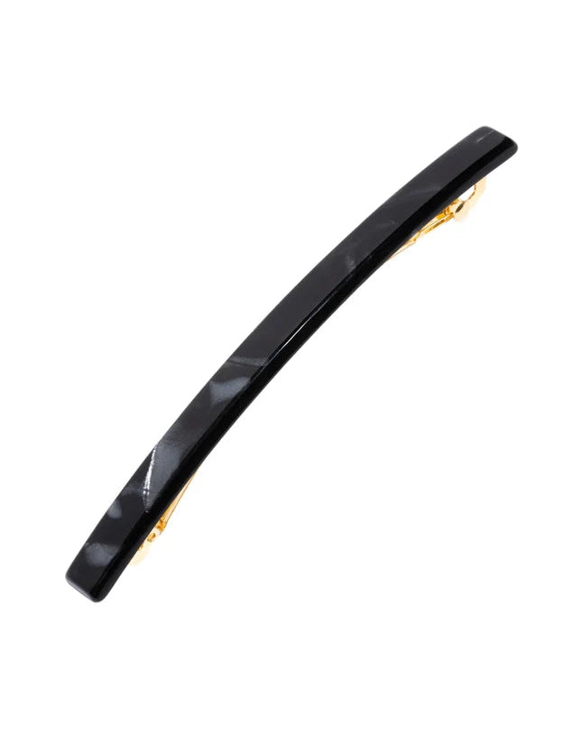 Black long hair barrette on a white background